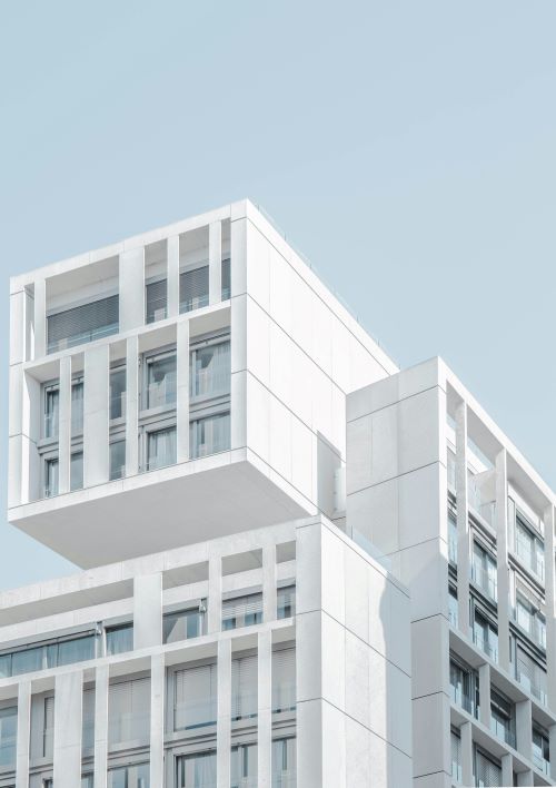 Moderne luxe appartementen met stijlvolle inrichting, symbool voor winstgevende vastgoedinvesteringen.